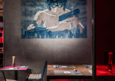asian restaurant with concrete walls and wall paintings
