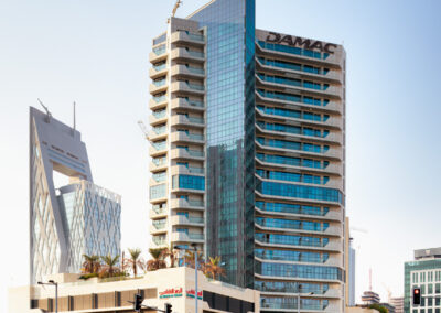 modern residential building with glass front in doha