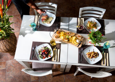top down view of a table with filled plates in a restaurant